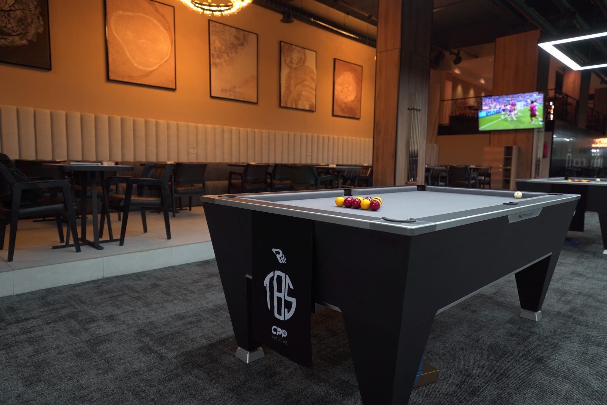 British pool table with red and yellow balls